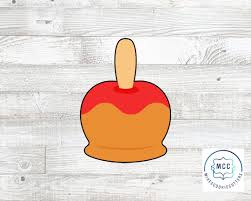 Caramel Carmel gameplay showing fruit multiplication with oranges and pink candies